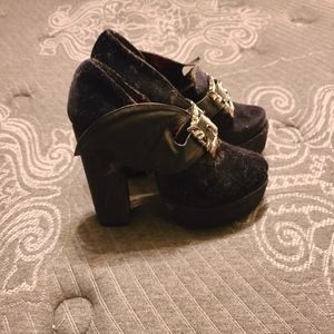 Iron fist bat wing high heels